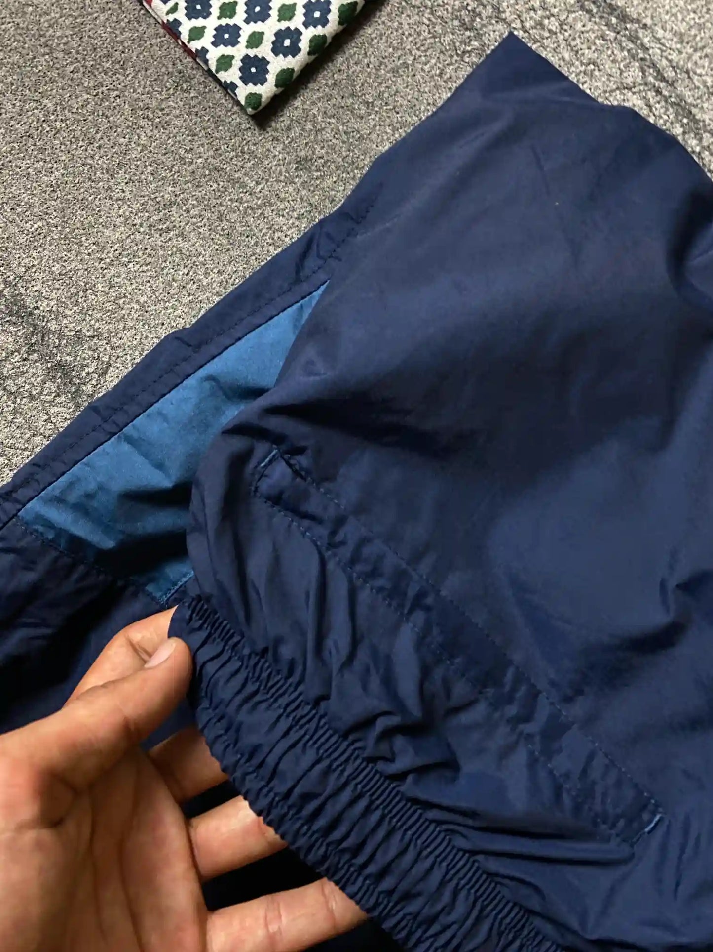 NIKE BAGGY TRACK TROUSERS