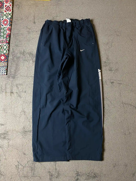 NIKE BAGGY TRACK TROUSER