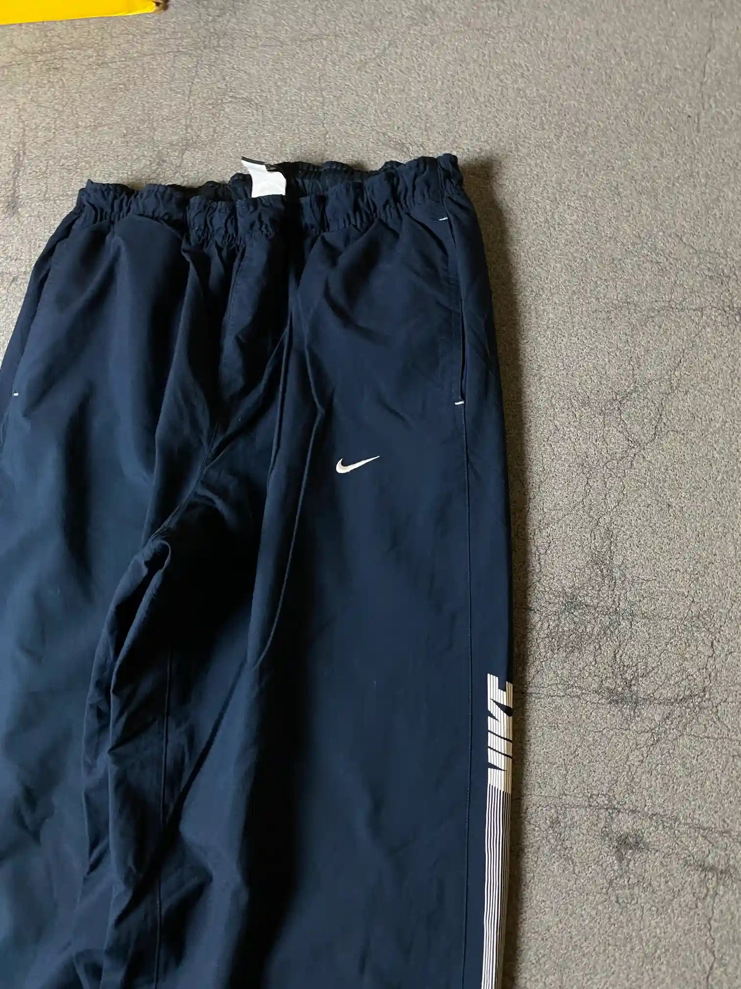NIKE BAGGY TRACK TROUSER