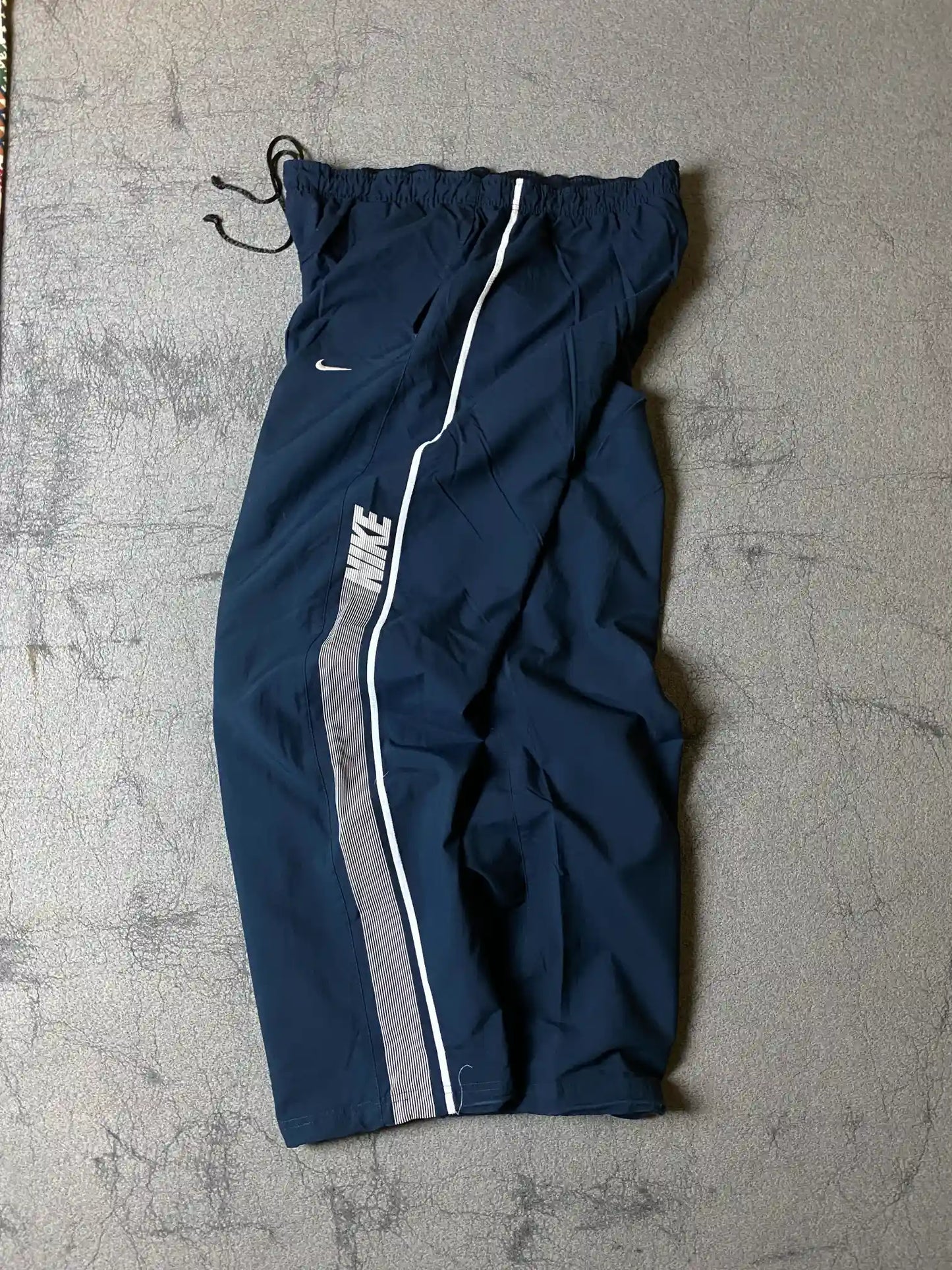 NIKE BAGGY TRACK TROUSER